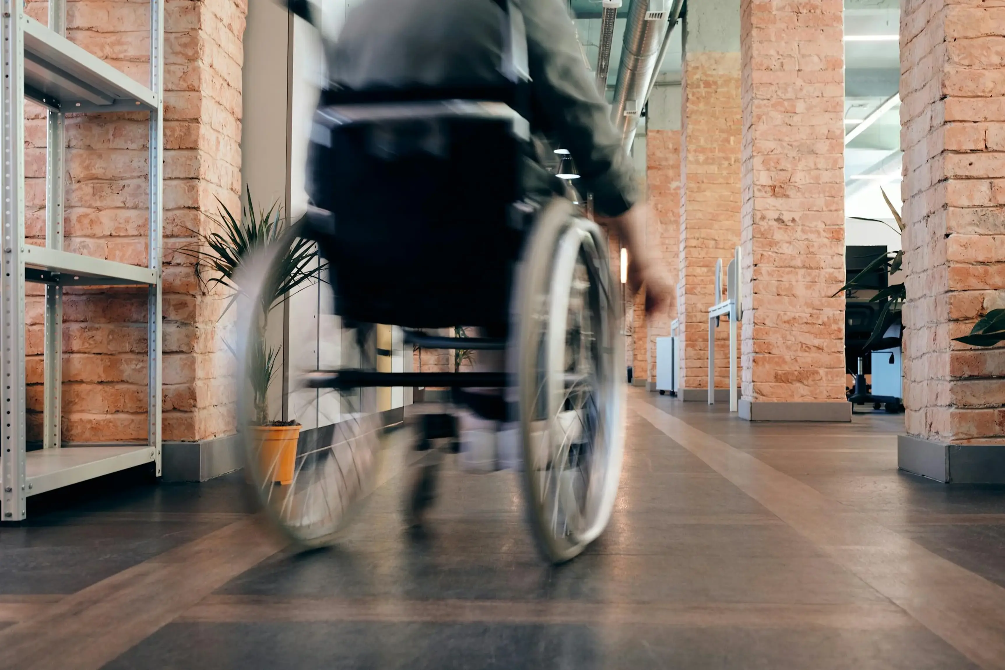 Person with reduced mobility in an office